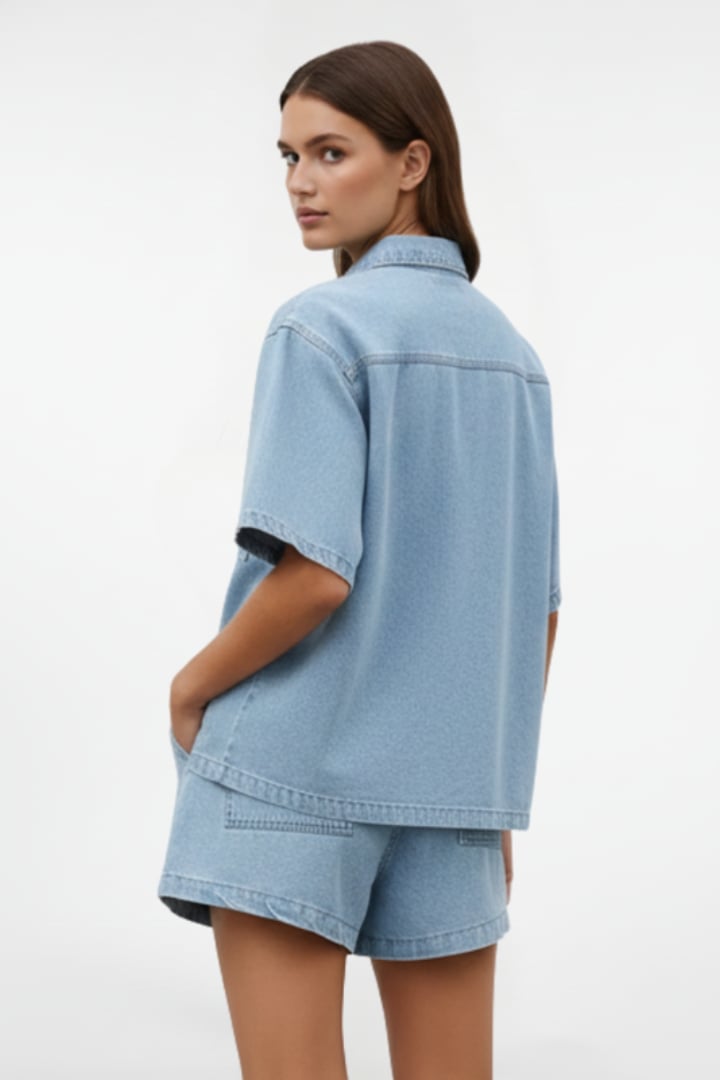 Side view of the Solara short sleeve collared set in blue showing relaxed fit