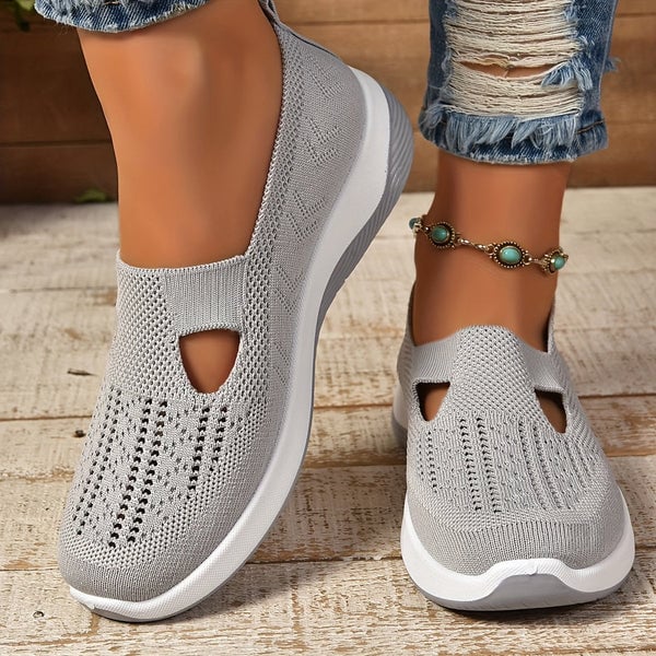 Soleil lightweight slip-on shoes in a neutral colorway displayed on a clean white background