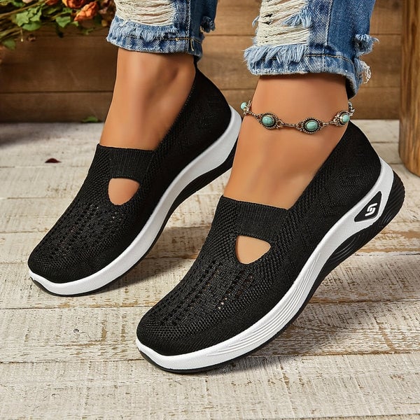Close-up side profile of Soleil slip-on shoes highlighting minimalist silhouette and non-slip sole