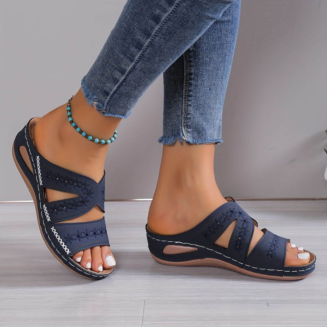Front view of slip-resistant orthopedic sandals with gel-infused sole in blue colorway