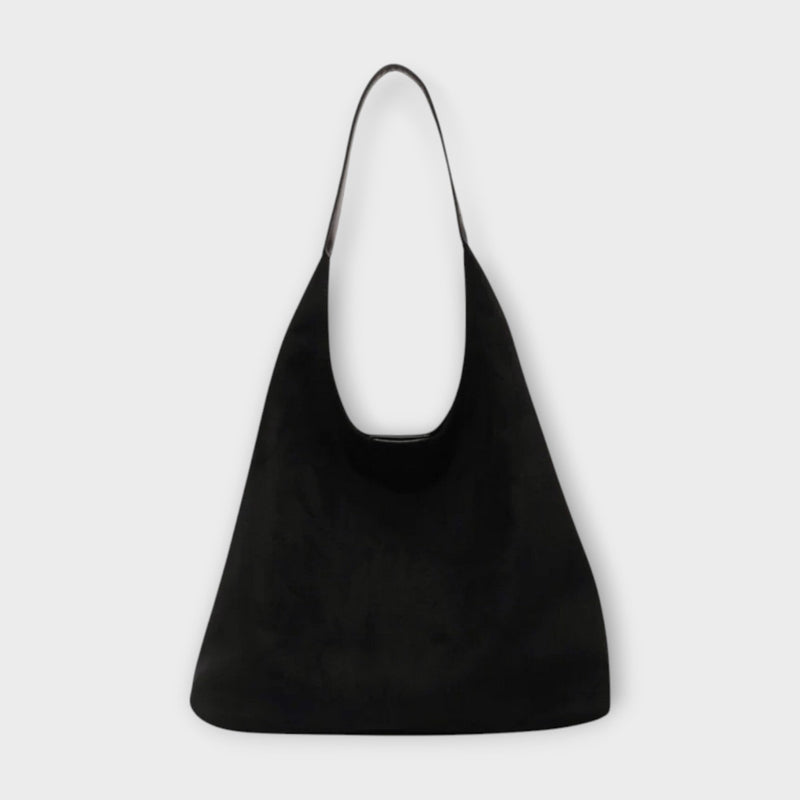 Soline shoulder bag styled in an everyday casual flat-lay with accessories