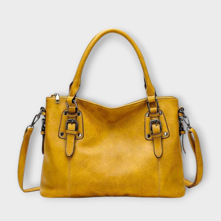 Solveig handbag in brown styled with a neutral everyday outfit