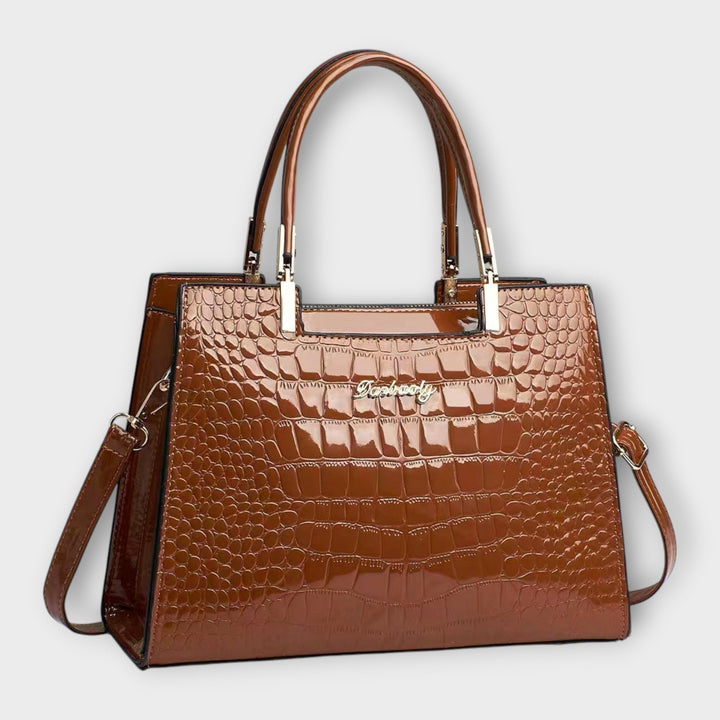 Red Solveig exclusive handbag shown front-facing to highlight bold color and structured design
