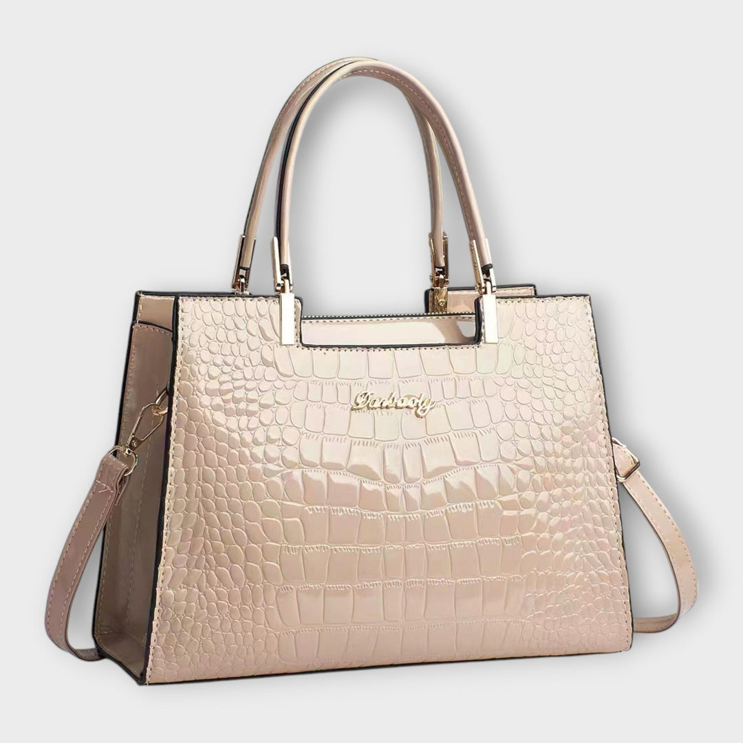 Solveig handbag in blue colorway styled to show versatile everyday carry potential