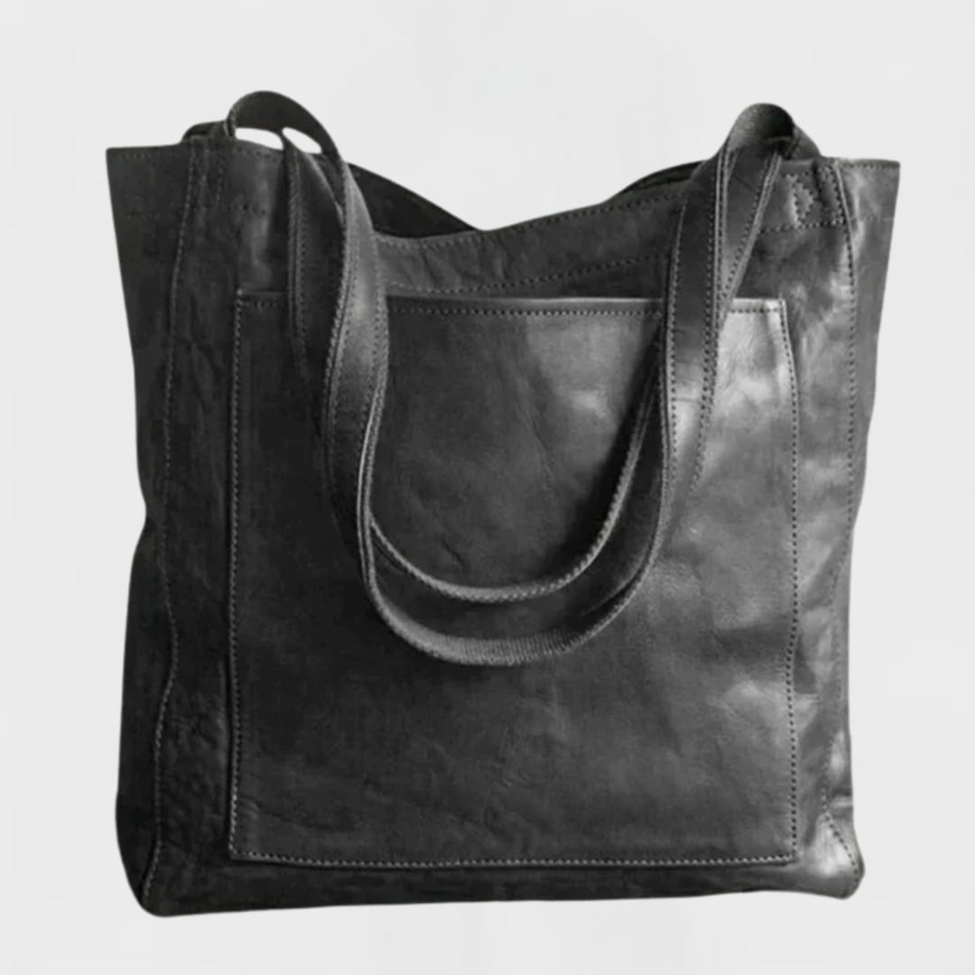 Black Solveig tote bag styled as an everyday carry shoulder bag