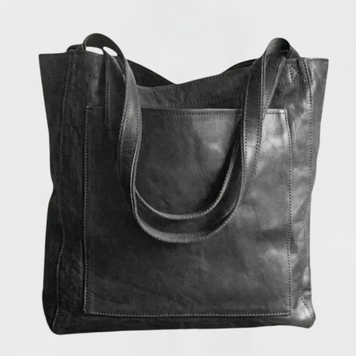 Black Solveig tote bag styled as an everyday carry shoulder bag