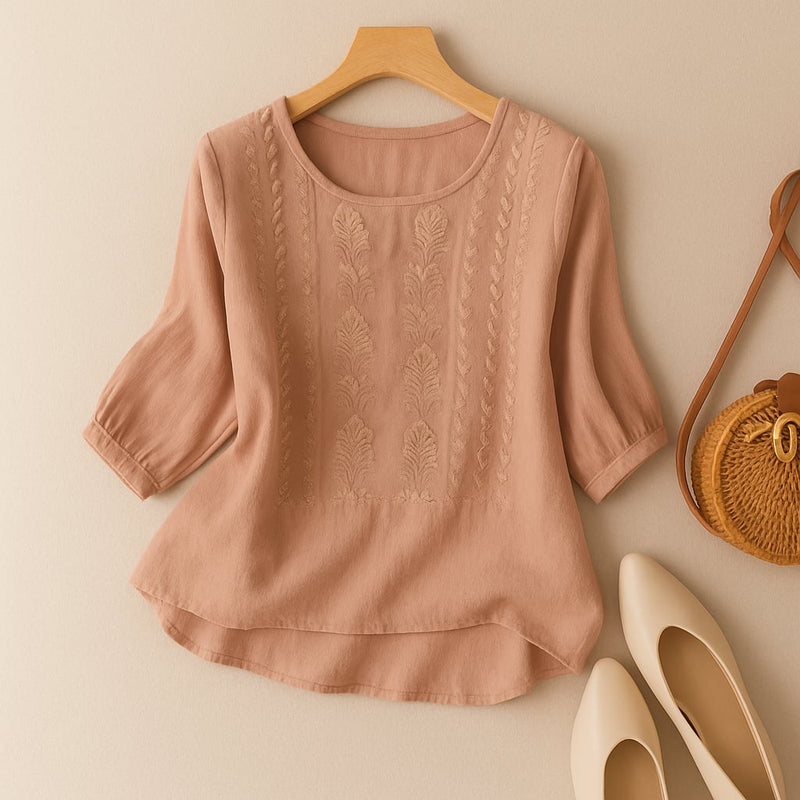 Sonia relaxed blouse styled with high-waist denim jeans for a polished casual everyday look