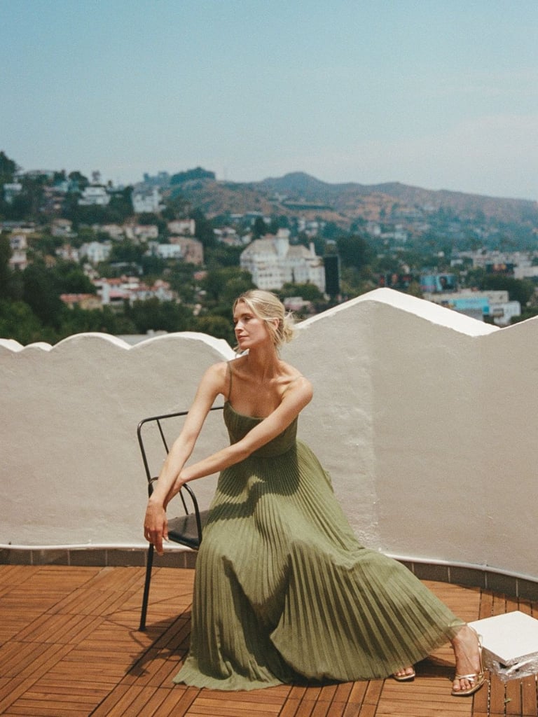 Detail shot of the sweetheart neckline on the olive green maxi dress