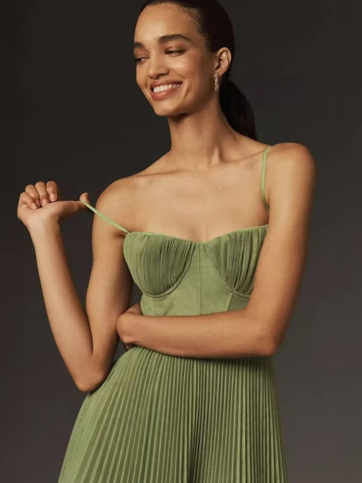 Detail shot of the pleated fabric texture on the olive green maxi dress