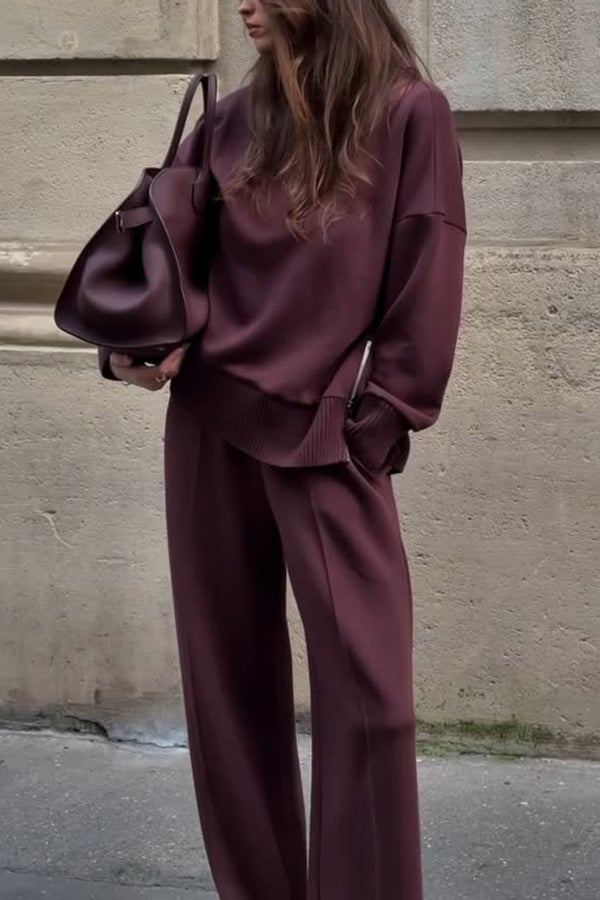 Model wearing the Soothe co-ord two-piece lounge set in Burgundy, showing relaxed-tailored fit and soft fabric