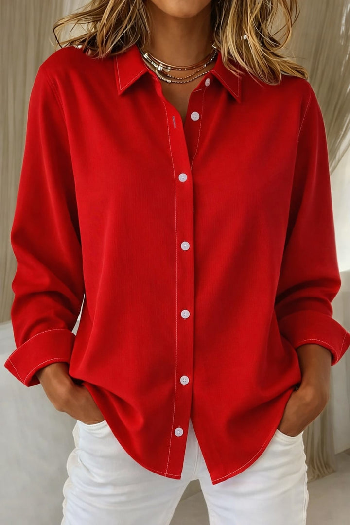 Close-up of the Sophie blouse button detail and lightweight fabric drape