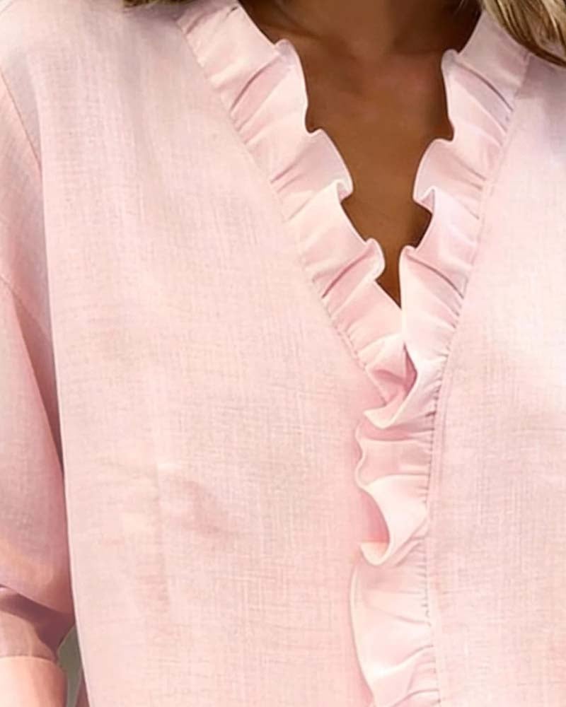 Back view of the Sophie long sleeve ruffle blouse in pink