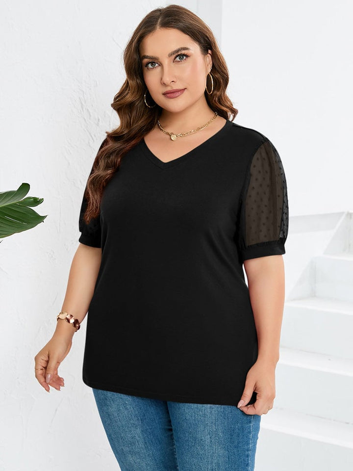 Sophora V-neck top in blue paired with high-waisted jeans for a casual weekend style