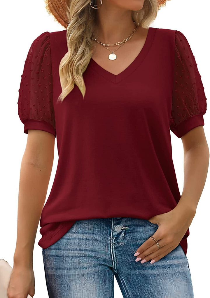 Flat lay of the Sophora V-neck top in white showing its clean minimalist design