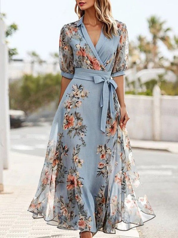Woman wearing a flowy V-neck midi dress with a gently flared skirt, styled for a casual daytime look