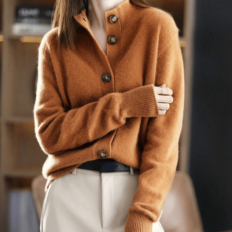 Model wearing an orange cashmere-style cardigan with a relaxed, flattering silhouette