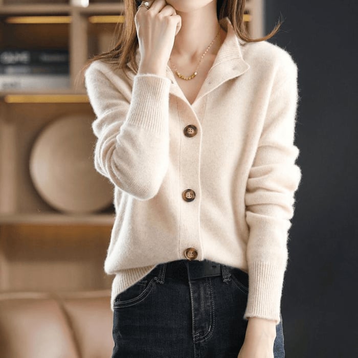Close-up detail of the soft cashmere-style fabric on the Stella cardigan in beige