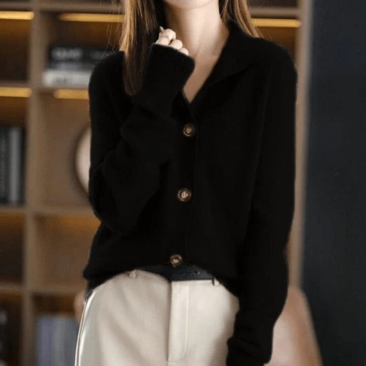 Front view of the black Stella cardigan showing its elegant drape and classic fit