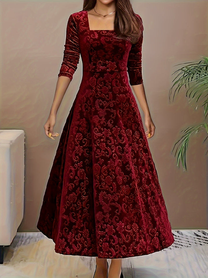 Front view of the Stella elegant dress in red, highlighting the flattering fit and graceful drape