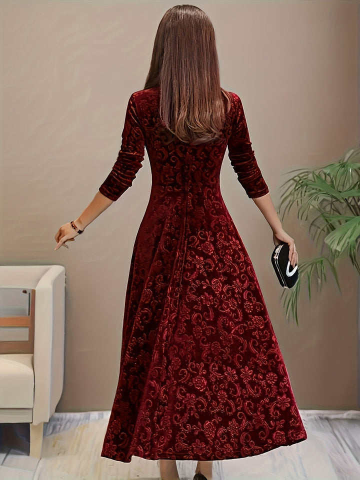 Back view of the Stella elegant dress in red displaying the clean, polished design lines