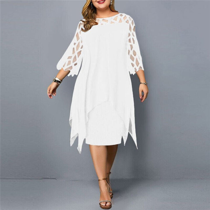 Stella draped midi dress in white styled with heeled sandals for an elegant occasion look