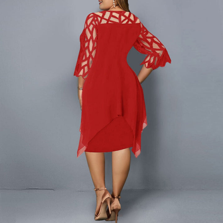 Plus size model wearing the Stella midi dress in deep blue, full-body view showing the curve-flattering drape