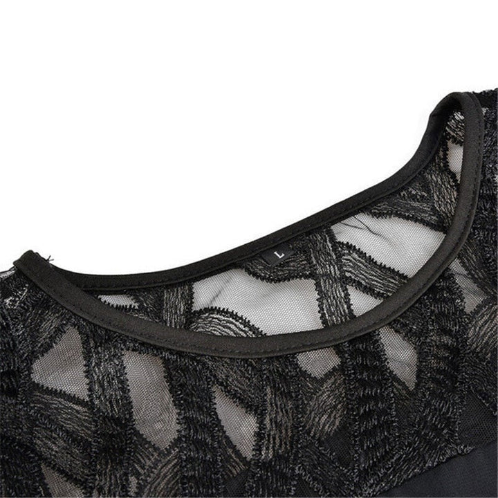 Back view of the Stella flowy midi dress in black, highlighting the clean elegant design