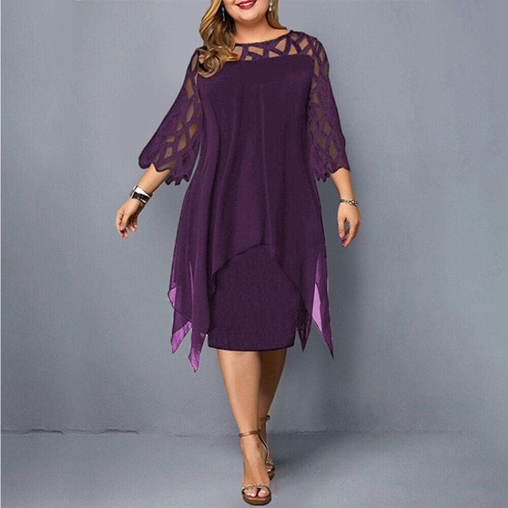 Lifestyle shot of a woman in the Stella draped midi dress in red wine at an outdoor event