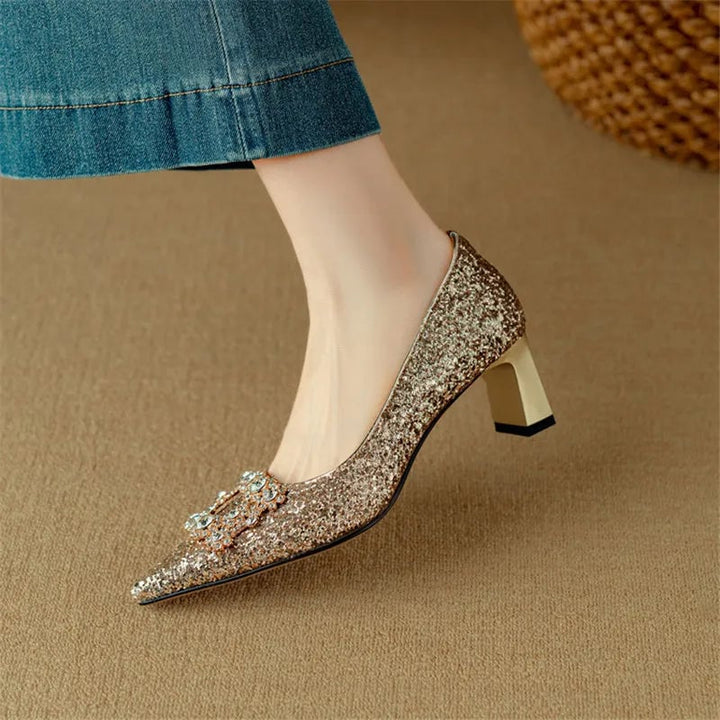 Stella gold glitter pump crystal buckle detail close-up at vamp