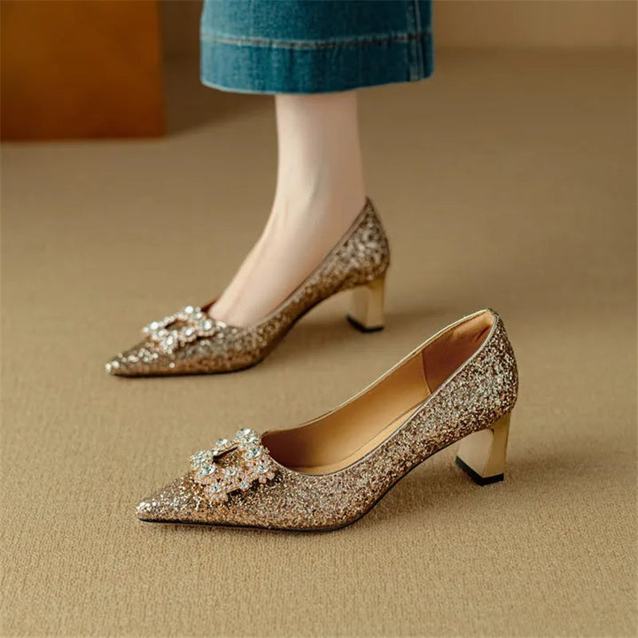 Stella gold glitter pump pointed toe close-up showing all-over shimmer finish