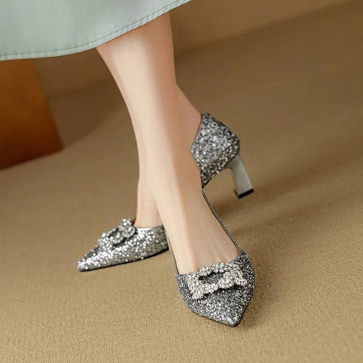 Stella gold glitter pumps three-quarter angle view showing glitter texture