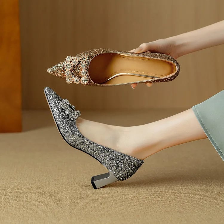 Stella silver glitter pumps three-quarter angle view showing glitter texture