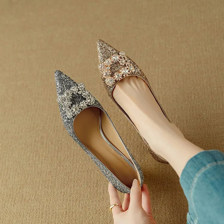 Stella silver glitter pumps sole view showing size and construction