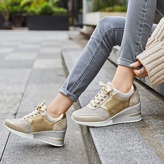 Stella hidden wedge lace-up glitter sneaker in gold with sparkle mesh upper and concealed platform sole
