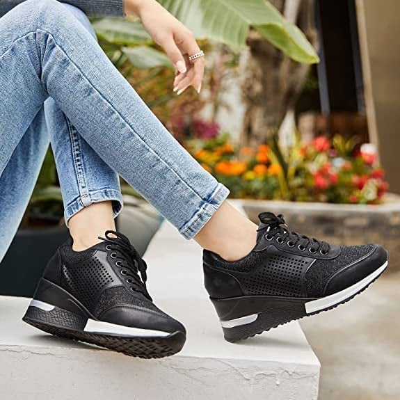 Stella hidden wedge sneaker in classic black with glitter mesh upper and padded collar detail