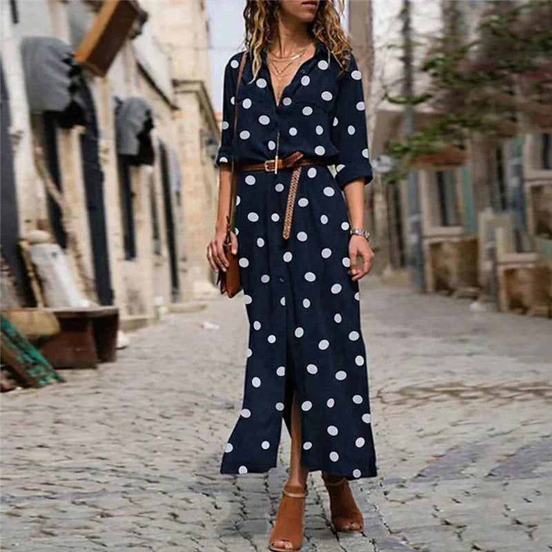 Stella polka dot long sleeve maxi dress in red with waist tie cinched, styled for a casual daytime look