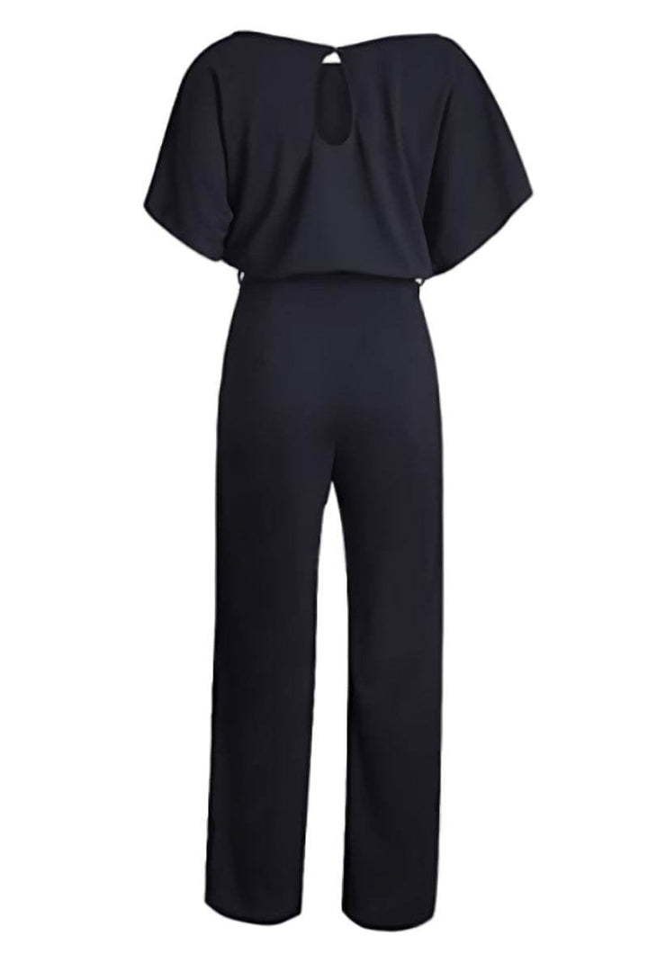 Flat lay of the Stella wide-leg belted jumpsuit in yellow showing the full silhouette and tie belt