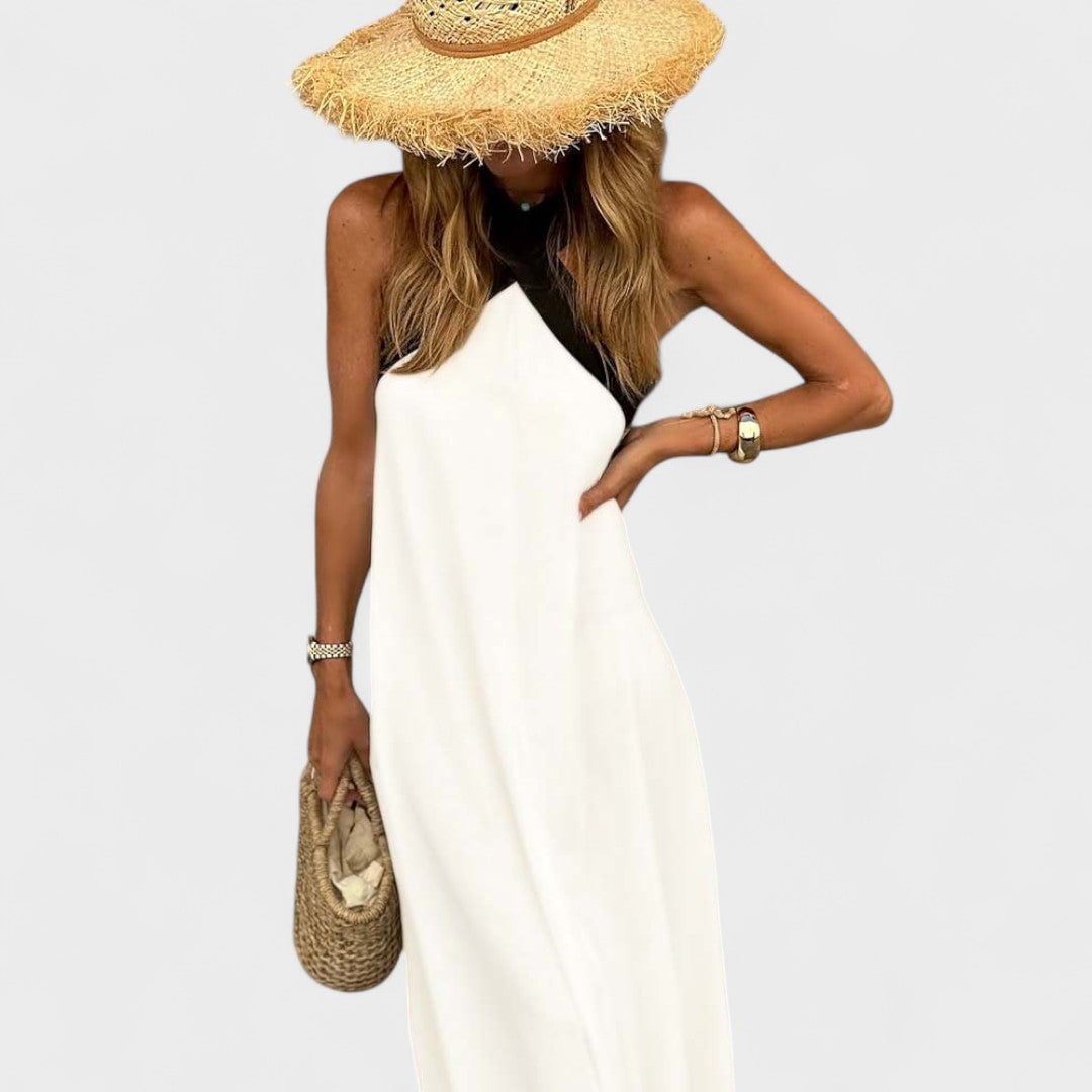 Full-body shot of the black elegant maxi dress highlighting the long flattering silhouette
