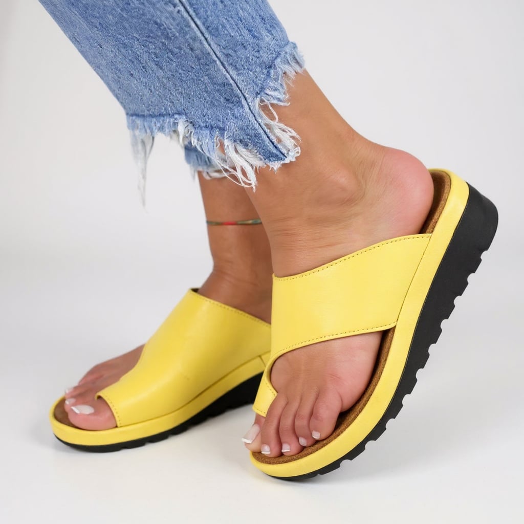 Suki sandal in Leopard print with adjustable ankle strap on a neutral background