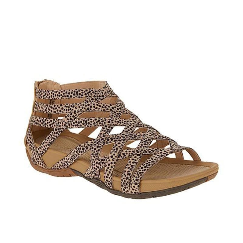 Women's orthopedic adjustable sandals in black, side view showing arch support