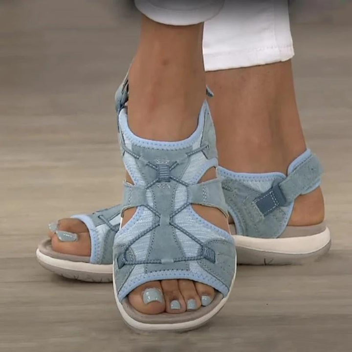 Side view of women's orthopedic sandals showing arch-supporting insole
