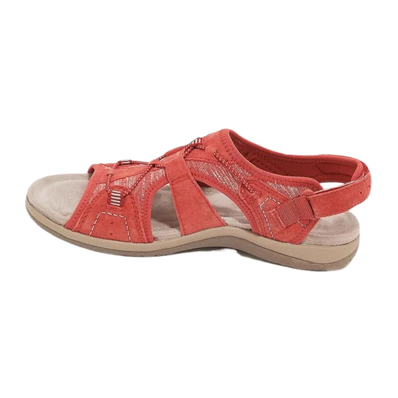 Women's orthopedic sandals in lavender on wooden surface
