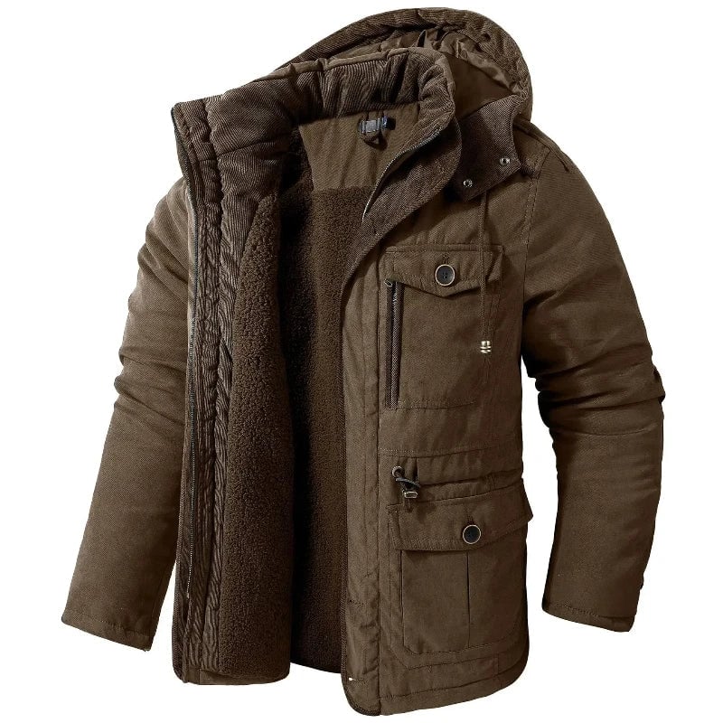 Women wearing the Summit Winter Jacket in brown styled with jeans for a casual winter look