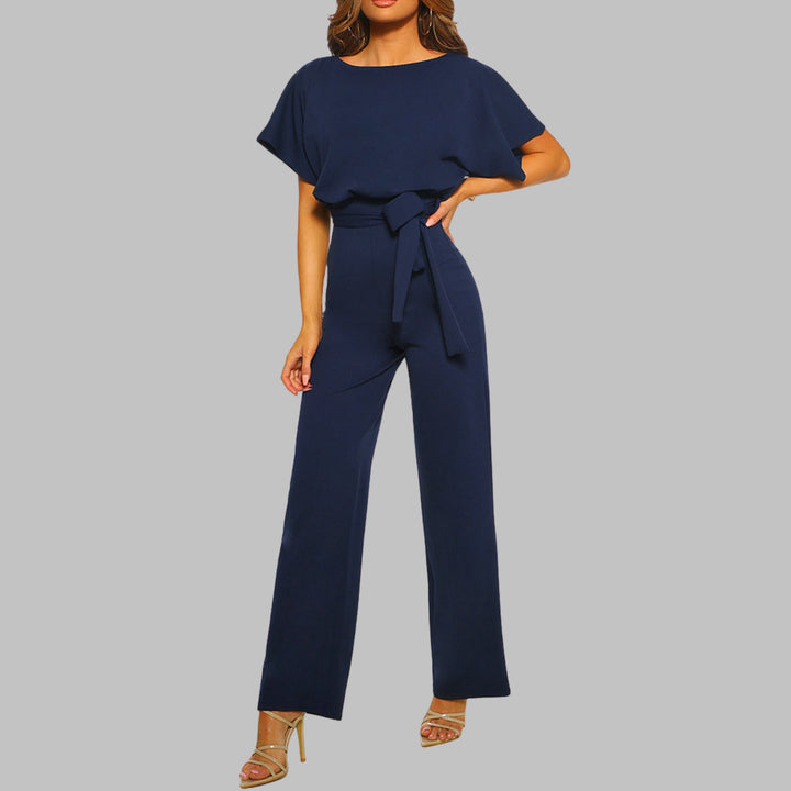 Back view of the yellow Sunny batwing sleeve jumpsuit showing the clean crewneck and flowing wide-leg pants