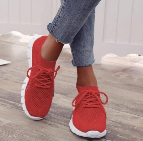 Side view of the Sunny knit sneaker showing breathable open-weave mesh upper and sock-like ankle collar