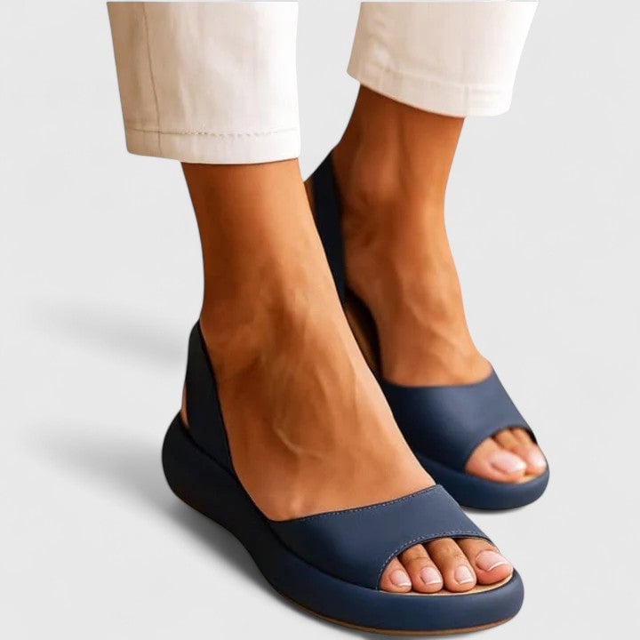 Sunny platform slingback sandal in yellow, side profile view