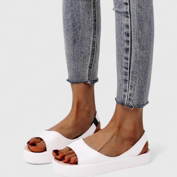 Close-up of chunky molded platform sole on the Sunny slingback sandal