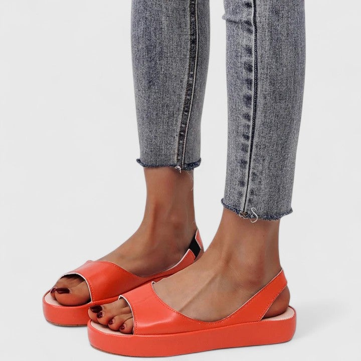 Close-up of wide toe strap detail on the Sunny platform sandal