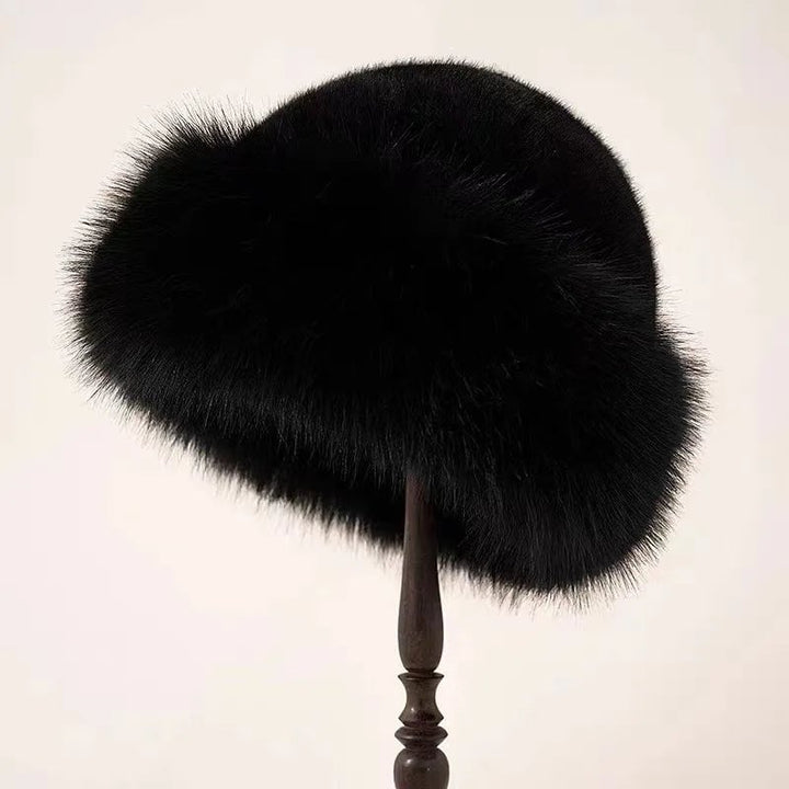 Side profile of a fluffy winter hat showing its chic sculpted shape and cozy plush exterior