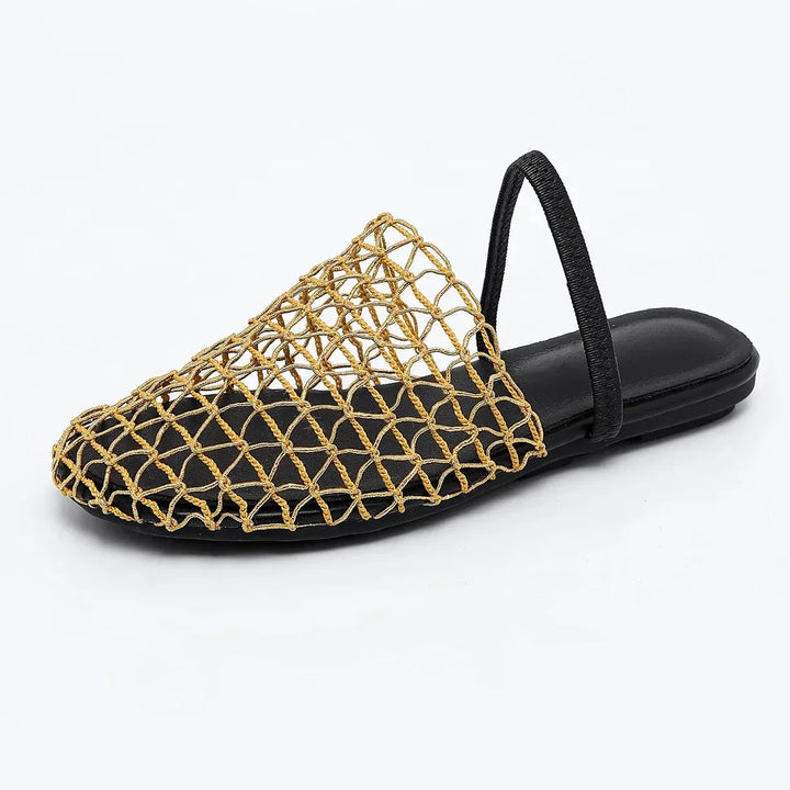 Flat lay of all five Suzette sandal color options: black, beige, dark brown, silver, and gold